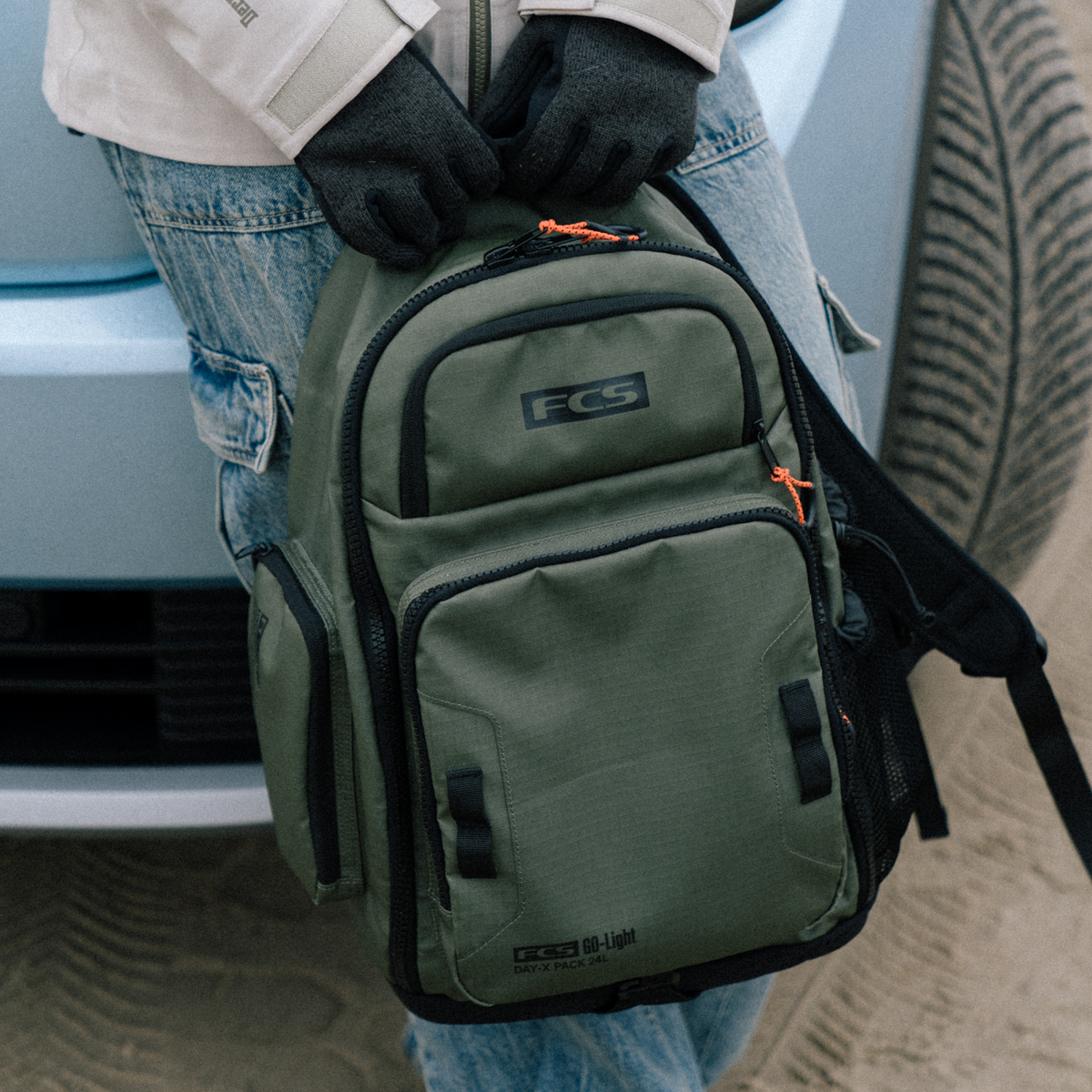 FCS Day-X Pack 24L carried by the top handle