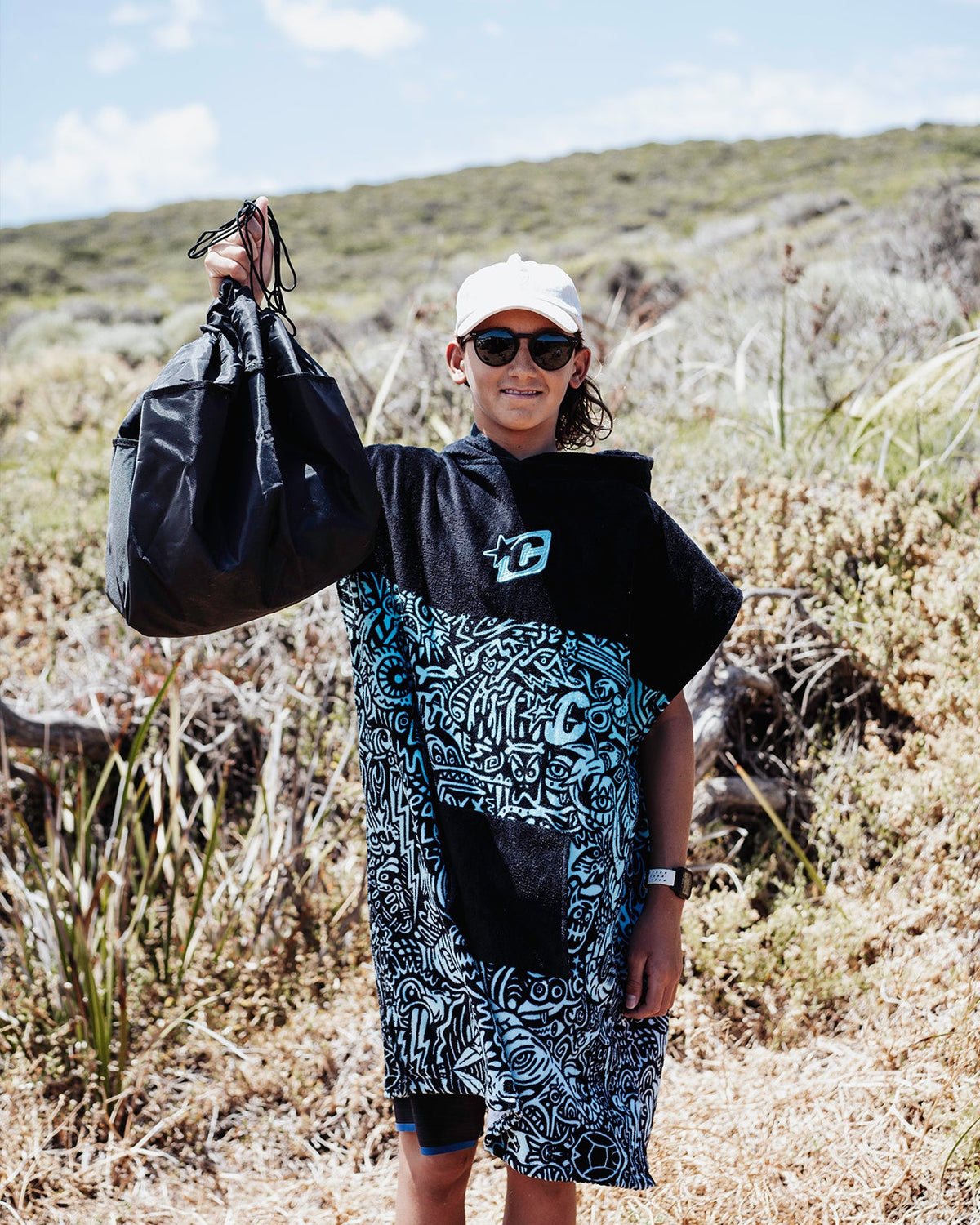 Creatures Grom Poncho in Black Multi Barbed Wire, back view